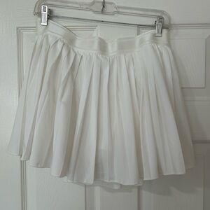 White pleated athletic tennis skirt with built in under shorts